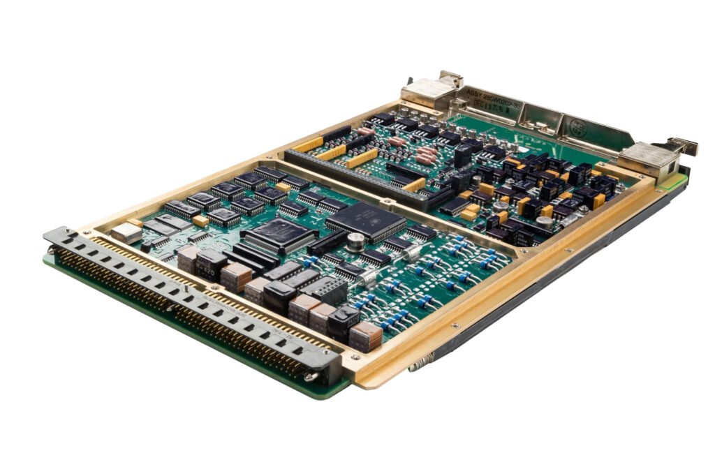 Populated electronic circuit board photographed at an angle