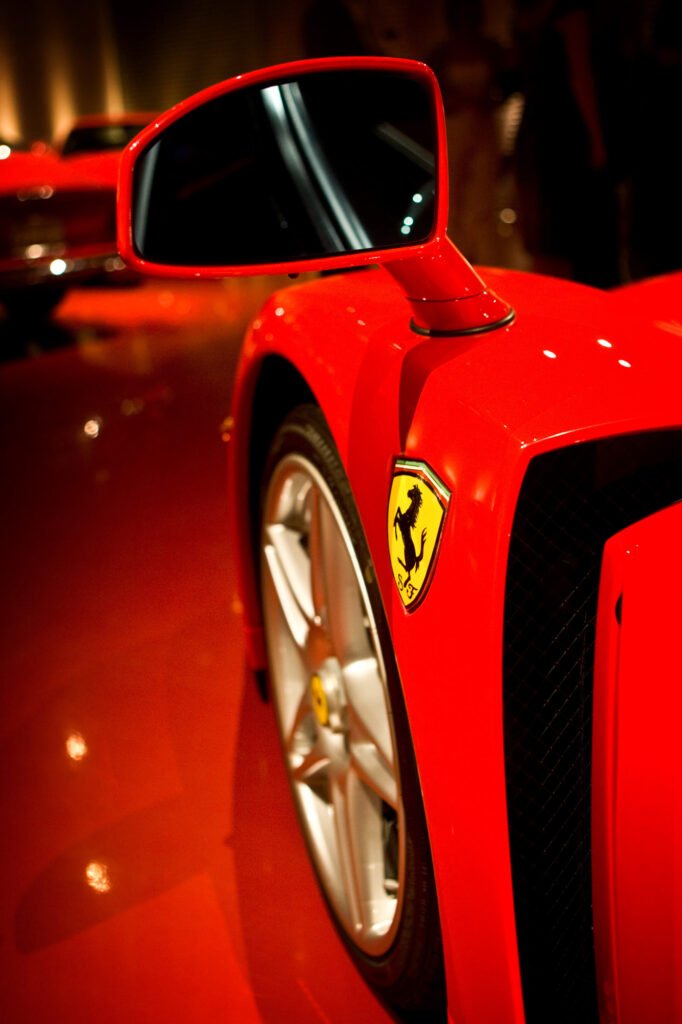 Close-up of a red sports car in a showroom